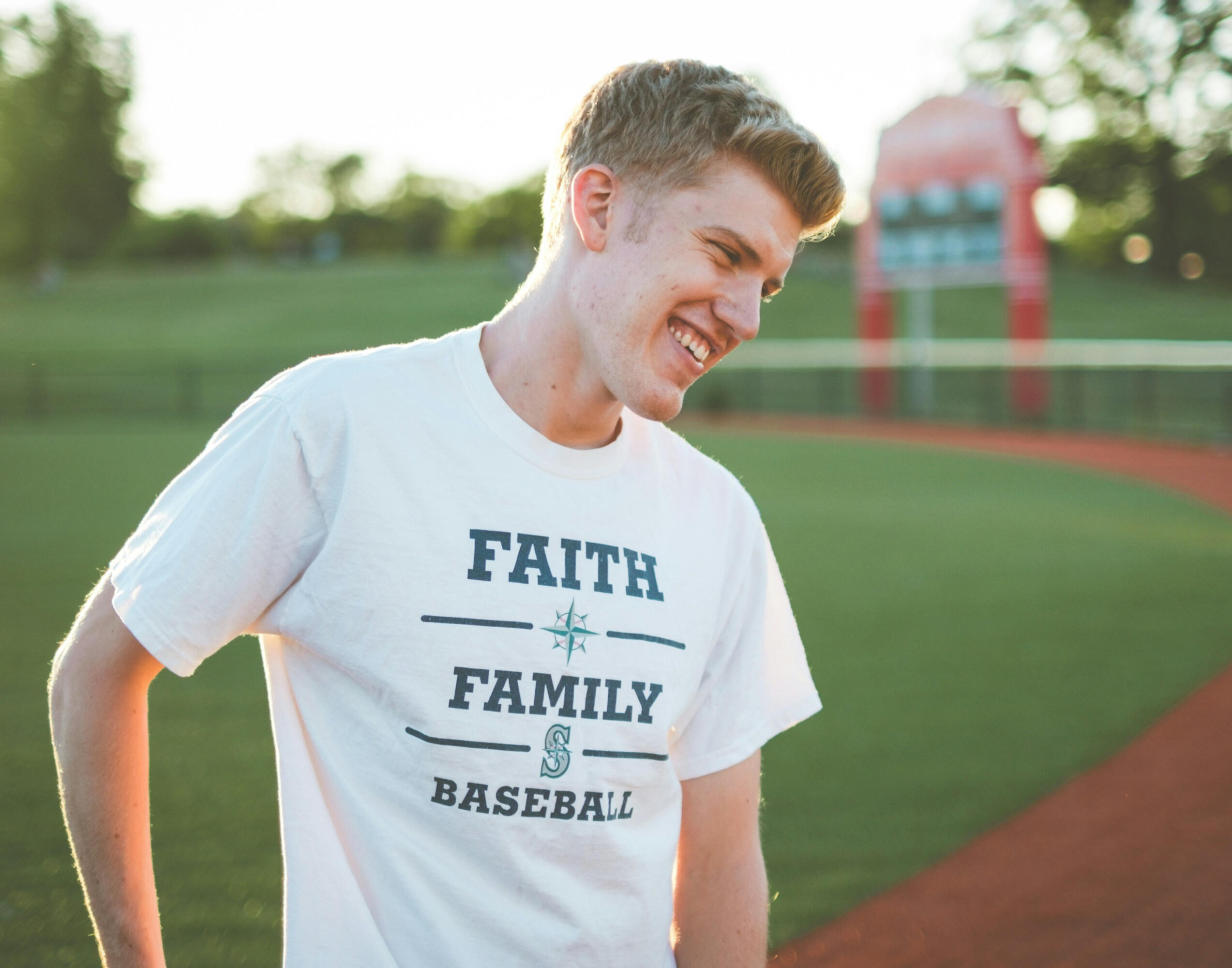Faith, family, and fun — many expat youth in Korea stay grounded through community sports and shared values. A smiling young man wearing a “Faith Family Baseball” shirt, representing the connection between faith, family, and community life for expat youth.